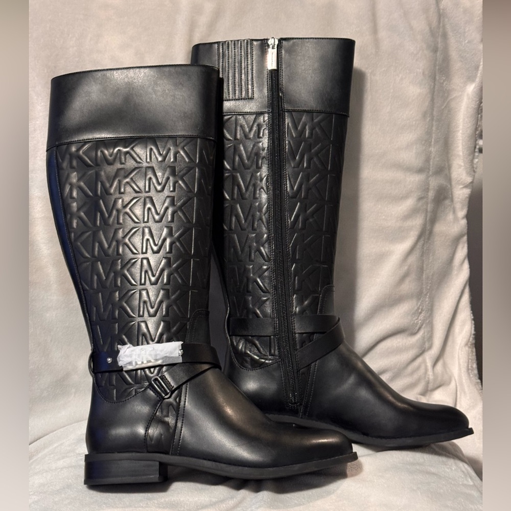 Michael Kors tall embossed boots. New never worn.